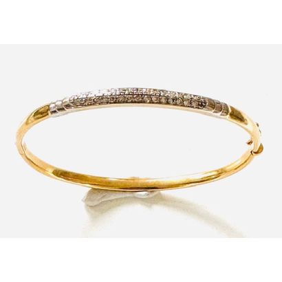 Rigid opening BRACELET in yellow gold 750°/°°...