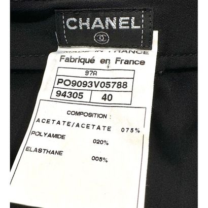 CHANEL. Black stretch acetate pants. Signed...