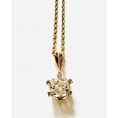 PENDANT in yellow gold 750°/°° set with an...