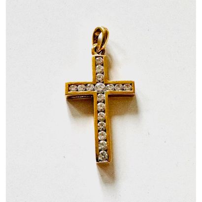 Cross pendant in yellow gold 750°/°° set...