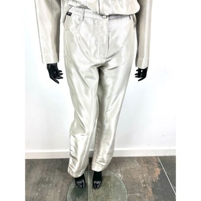 CHANEL. Denim pants in silver silk satin...