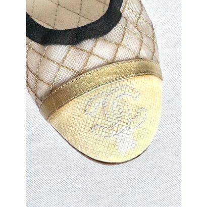 CHANEL. Pair of ballet flats in gold leather...