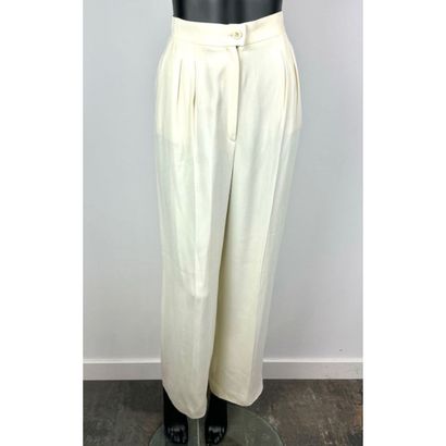CHANEL Boutique. Off-white silk crepe pants....