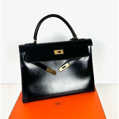 HERMES Paris. Kelly bag (32cm) in black box....