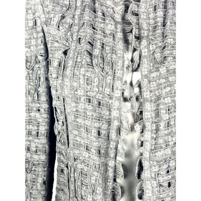 CHANEL. Evening jacket in black cotton lace...