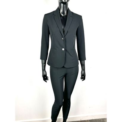THE ROW. Black stretch polyester set with...
