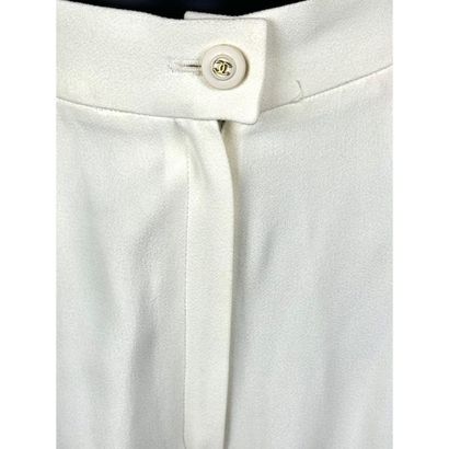 CHANEL Boutique. Off-white silk crepe pants....