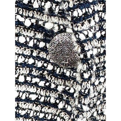 CHANEL. Black, pearl-grey and gold tweed...