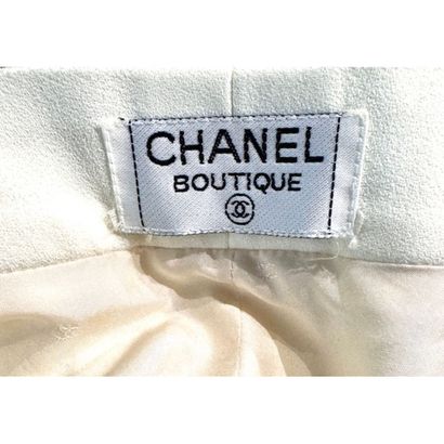 CHANEL Boutique. Off-white silk crepe pants....