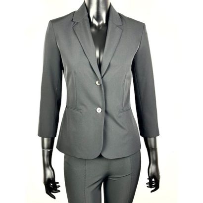 THE ROW. Black stretch polyester set with...
