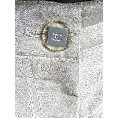 CHANEL. Denim pants in silver silk satin...