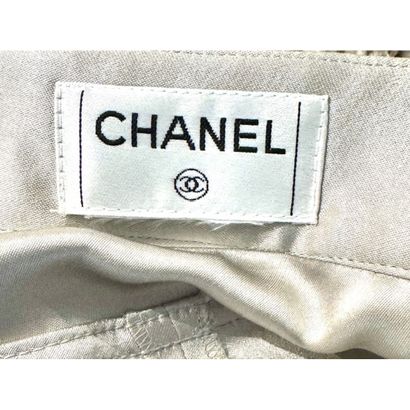CHANEL. Soft silk pants in silver-pearl grey....