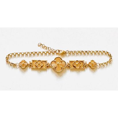 BRACELET in yellow gold 750°/°° with striated...