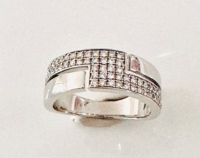 White gold RING adorned with a diamond-paved...
