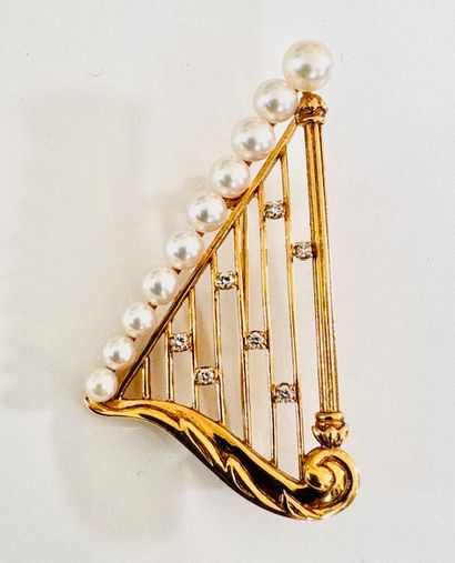 750°/°° yellow gold lyre brooch set with...