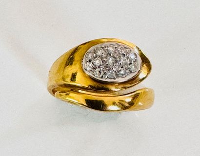 Snake ring in yellow gold 750°/°° set with...