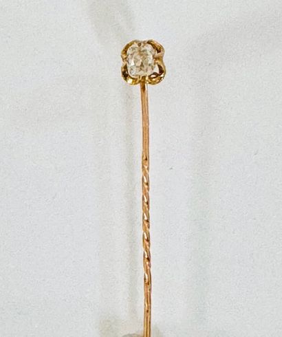 TIE PINGLE in yellow gold 750°/°° set with...