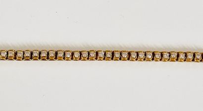 Tennis BRACELET in yellow gold 750°/°° set...