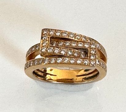 BAGUE en or jaune 750°/°° géométrique enchevêtrée...