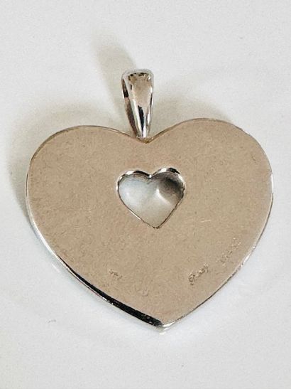 POIRAY. Heart pendant in 750°/°° white gold...