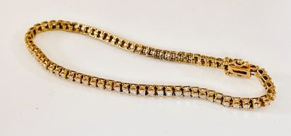 Tennis BRACELET in yellow gold 750°/°° set...