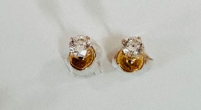 PAIR OF EARRINGS in yellow gold 750°/°° set...