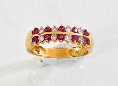 RING in yellow gold 750°/°° set with 2 lines...