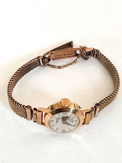 ROAMER. Montre de dame en or jaune 750°/°°....