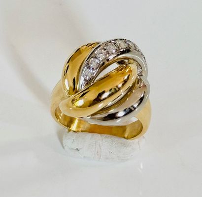 BAGUE dôme 2 ors 750°/°° torsadés ornée d’une...