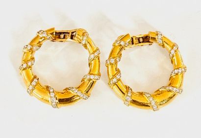 CARTIER. (?) PAIR OF CREOLES in yellow gold...