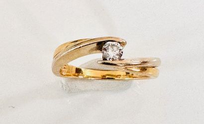 2-gold cross ring set with a 0ct13 diamond....