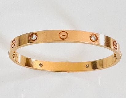 CARTIER. Bracelet «Love» rigide en or jaune...