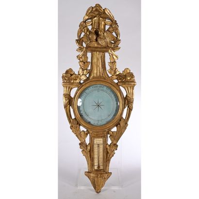 BAROMETRE LOUIS XVI en bois doré et sculpté...