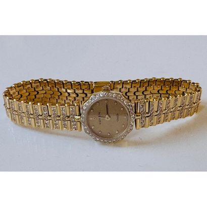 CORUM. Ladies' watch in yellow gold 750°/°°....