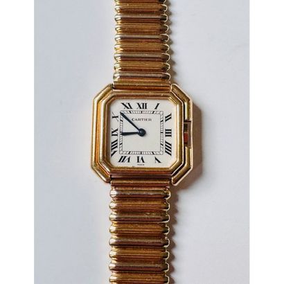 CARTIER. Watch in yellow gold 750°/°° Ceinture...