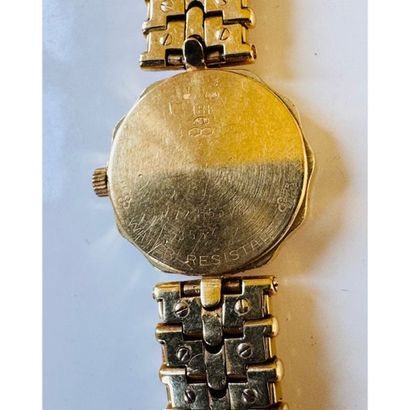 CORUM. Ladies' watch in yellow gold 750°/°°....