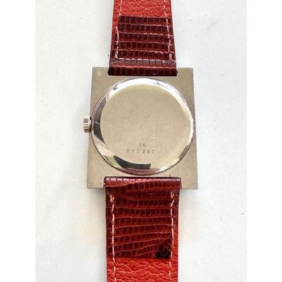 LONGINES. Rectangular steel watch with oval...