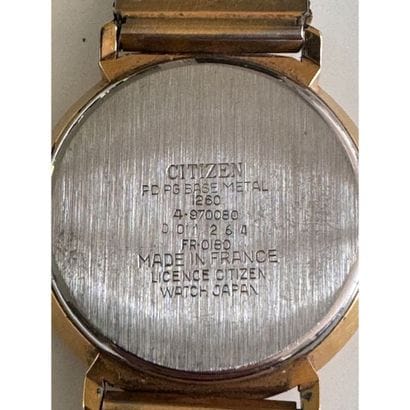 CITIZEN. Watch in gilt metal. Round dial....