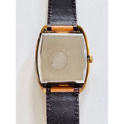 ZENITH. Barrel-shaped watch in gilt metal...