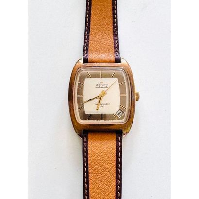 ZENITH. Barrel-shaped watch in gilt metal...