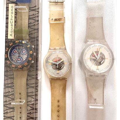 SWATCH. 3 Swatch watches including a Translucent...