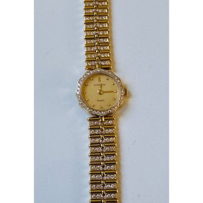 CORUM. Ladies' watch in yellow gold 750°/°°....