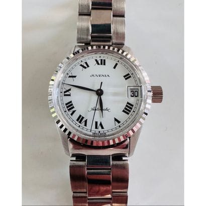 JUVENIA 1980. Steel watch. Round case with...
