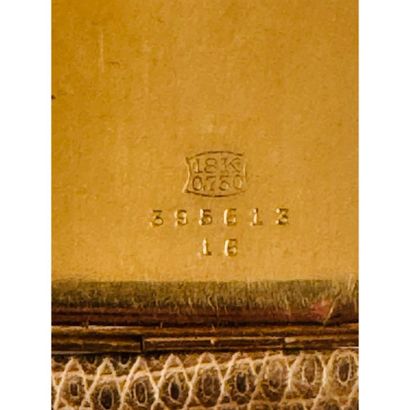ART DECO. Rectangular watch in yellow gold...