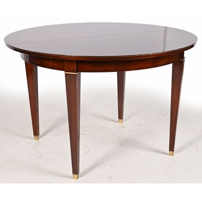 JULES LELEU. Round dining room table with...