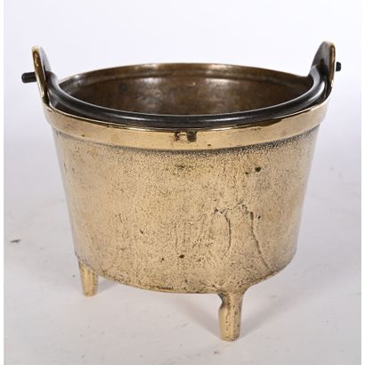 SMALL BRONZE JUG with tripod base. Swinging...