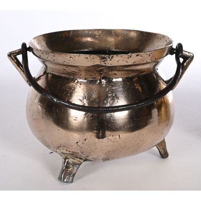 Bronze goblet with tripod base and swinging...