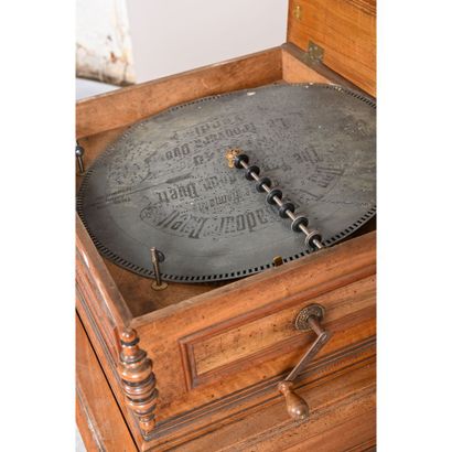MUSIC CABINET with large metal discs. Mechanism...