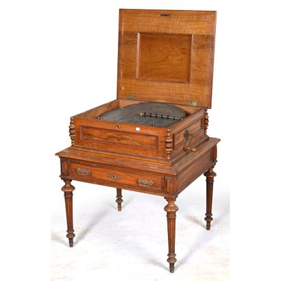 MUSIC CABINET with large metal discs. Mechanism...