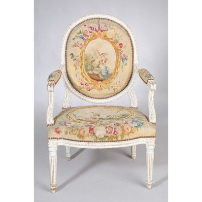 PAIRE DE FAUTEUILS LOUIS XVI en bois rechampi...